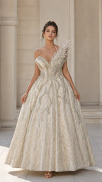 Champagne asymmetrical beaded ball gown with feather shoulder accent front view