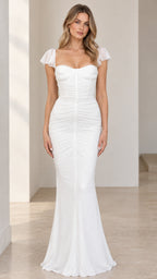 Front full-length view of white sweetheart mermaid maxi dress with flutter sleeves