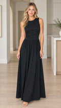 Front view of model wearing a black sleeveless ruched waist maxi dress