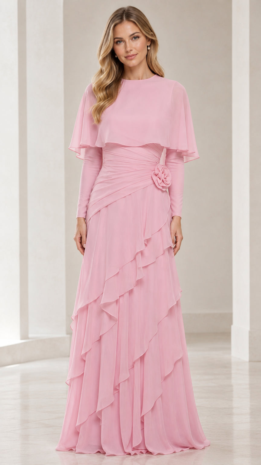 Front view of model wearing pink capelet tiered ruffle maxi dress