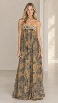 Front full view of woman wearing strapless golden tan floral print empire waist maxi dress