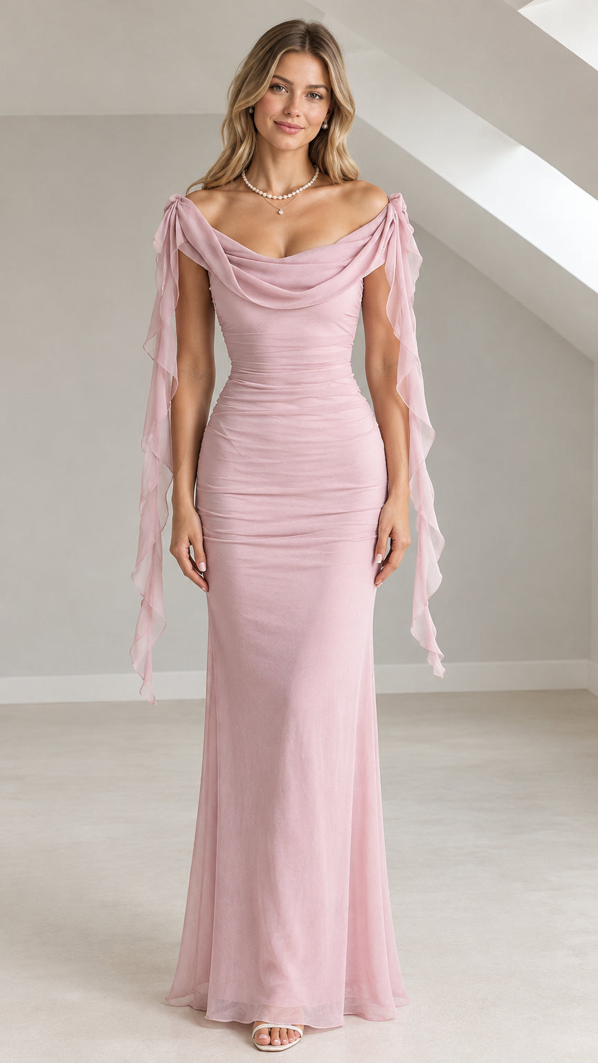 Full front view of a woman wearing a dusty pink off-the-shoulder ruched maxi evening gown with draped cowl neck and cascading sleeves