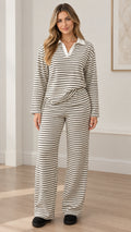 Front full view of woman wearing white striped polo collar top and wide leg pants lounge set