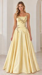 Front view of model wearing pastel yellow embroidered basque waist satin evening gown