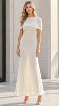 Front full-length view of model wearing the Ivory beaded capelet maxi evening dress