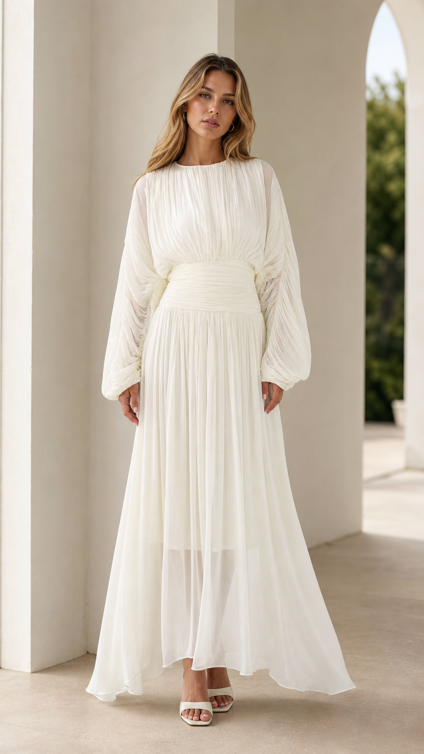 Front full view of white pleated long sleeve maxi dress