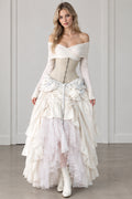 Front view of model wearing ivory off-shoulder corset maxi dress with tiered ruffle skirt