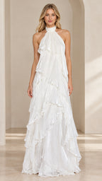 Front view of woman wearing a white halter neck tiered ruffle maxi dress
