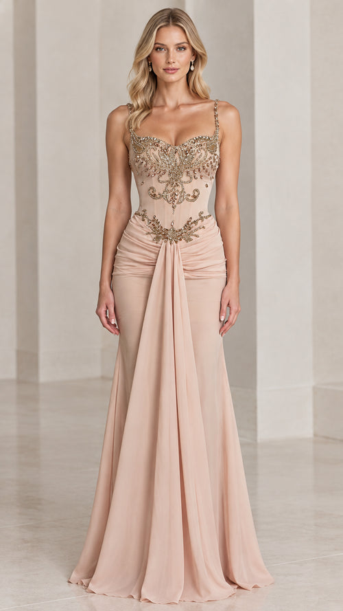 Full front view of blush pink beaded corset mermaid evening gown with ruched waist and drape