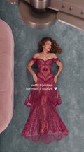 Front view of model wearing burgundy off-the-shoulder beaded mermaid evening gown