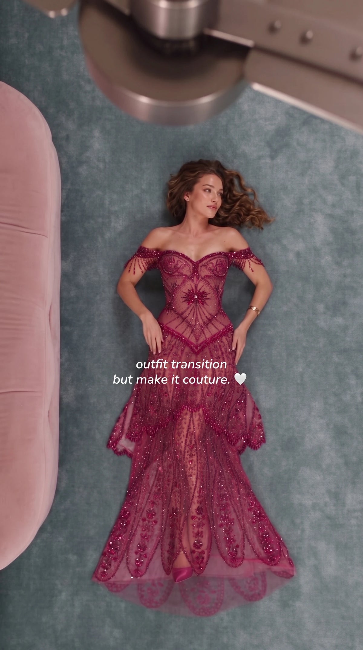 Front view of model wearing burgundy off-the-shoulder beaded mermaid evening gown