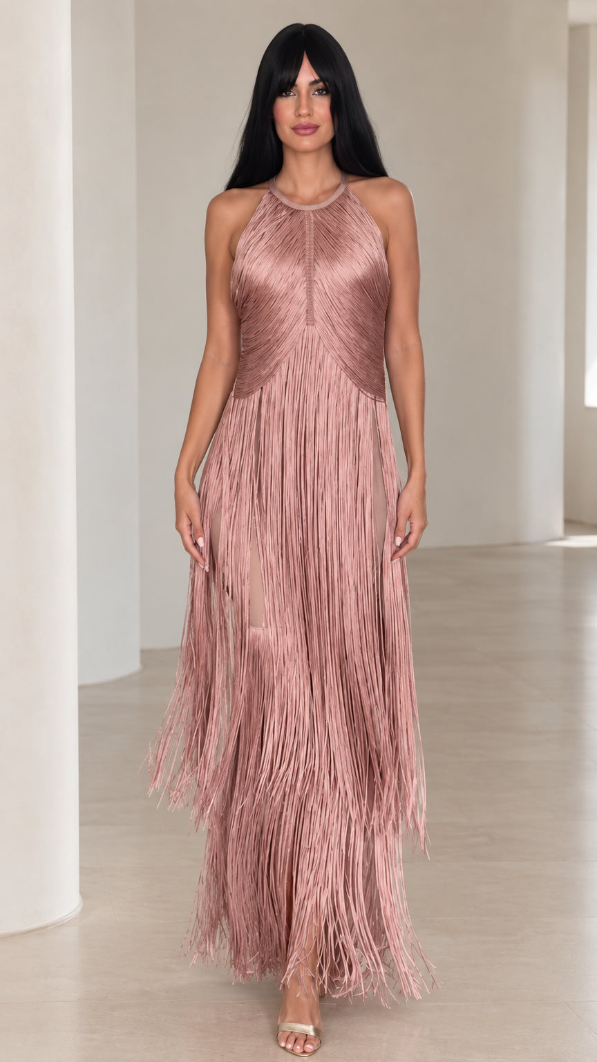 Front view of woman wearing dusty rose halter neck tiered fringe maxi dress