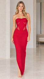 Front view of model wearing red strapless corset maxi dress with sheer lace panels