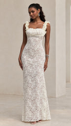 White floral lace sleeveless maxi dress with ruffled straps and column silhouette on model front view