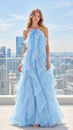 Front full-length view of woman wearing a light blue halter tiered ruffle maxi gown