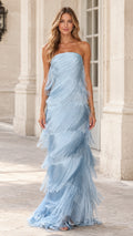 Front view of woman wearing sky blue strapless tiered fringe maxi evening dress