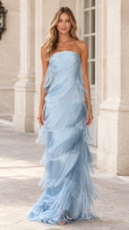 Front view of woman wearing sky blue strapless tiered fringe maxi evening dress