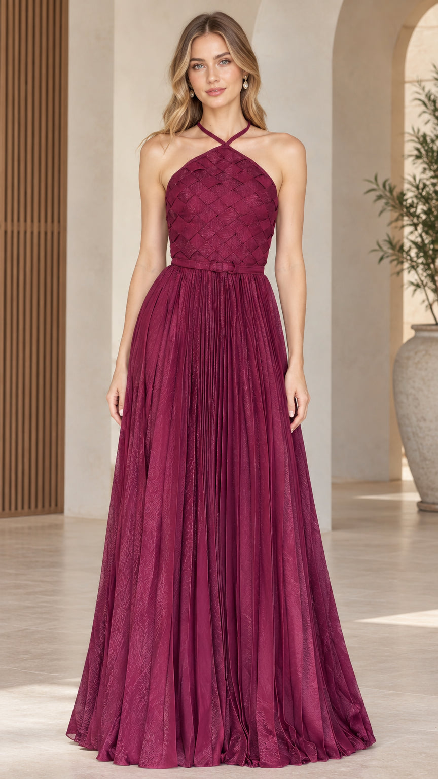 Front full-length view of woman wearing Wine halter neck pleated maxi dress with textured woven bodice