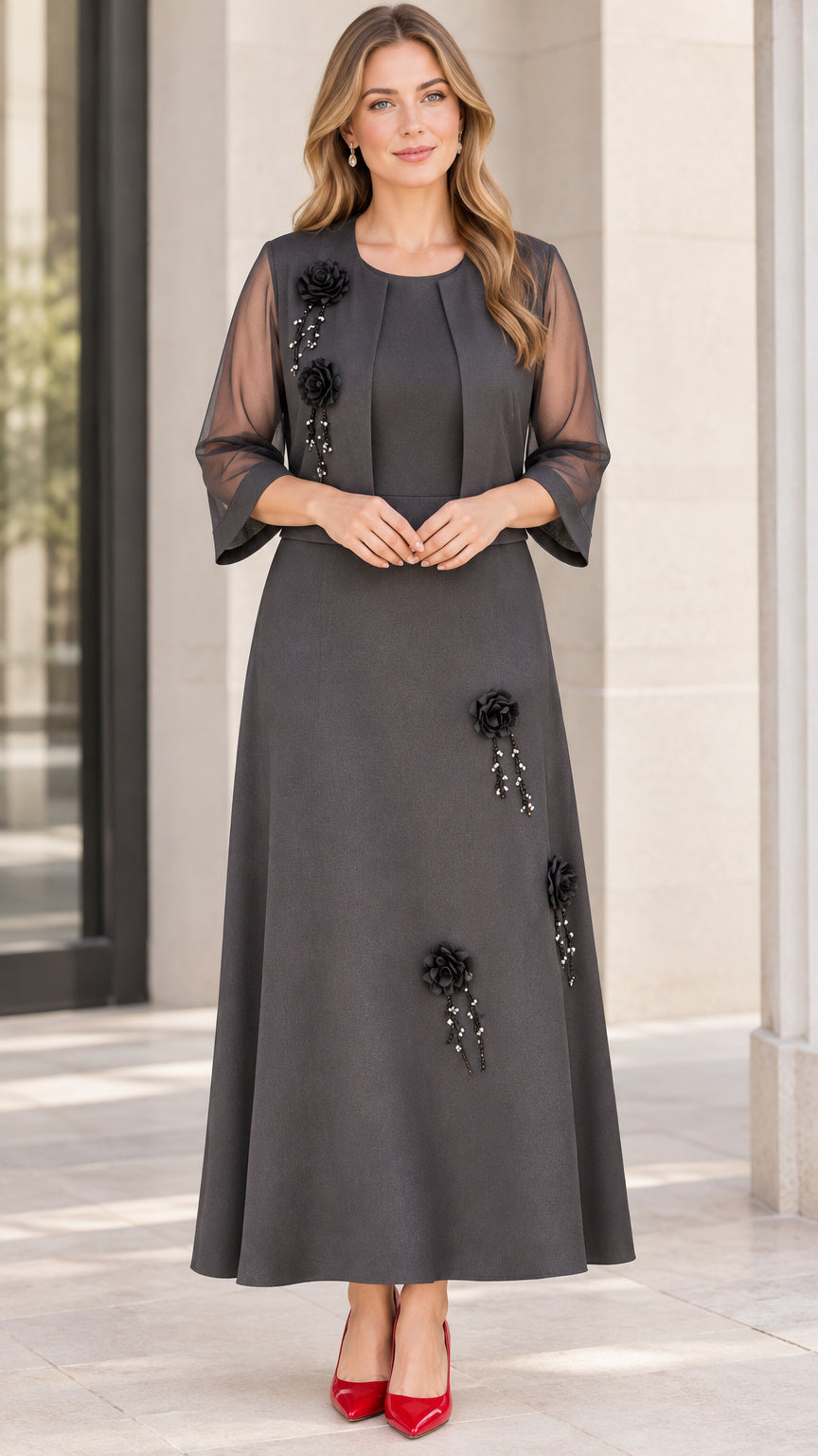 Charcoal grey two-piece formal dress set with cropped bolero jacket and floral appliques front view
