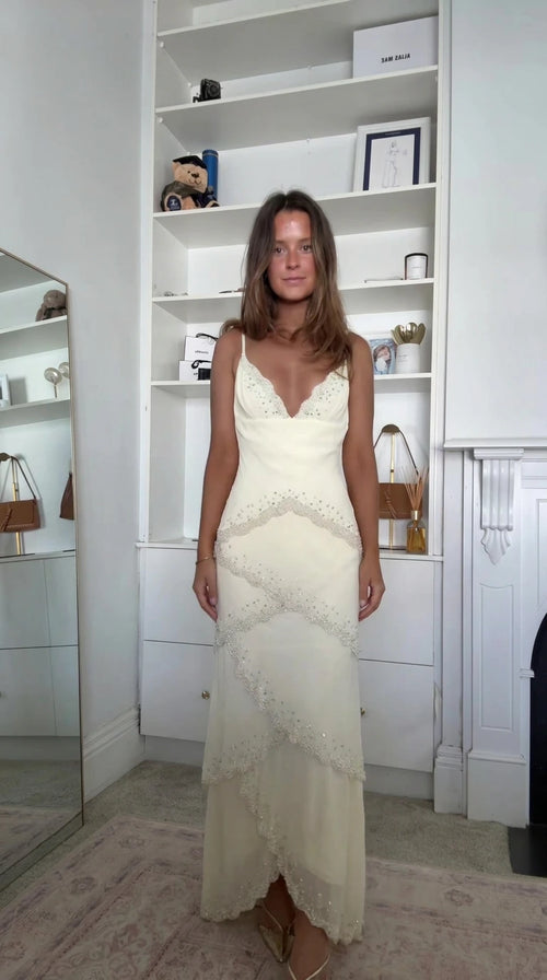 Front full-length view of the Ivory Beaded Scalloped Tiered Maxi Slip Dress