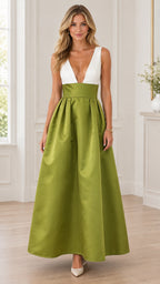 Front view of model wearing olive green and white deep V-neck pleated A-line maxi evening gown