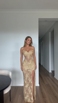 Full front view of model wearing Champagne Gold embroidered lace corset evening gown with high slit