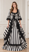Front view of model wearing black and white striped Victorian ballgown dress with lace neckline and bell sleeves
