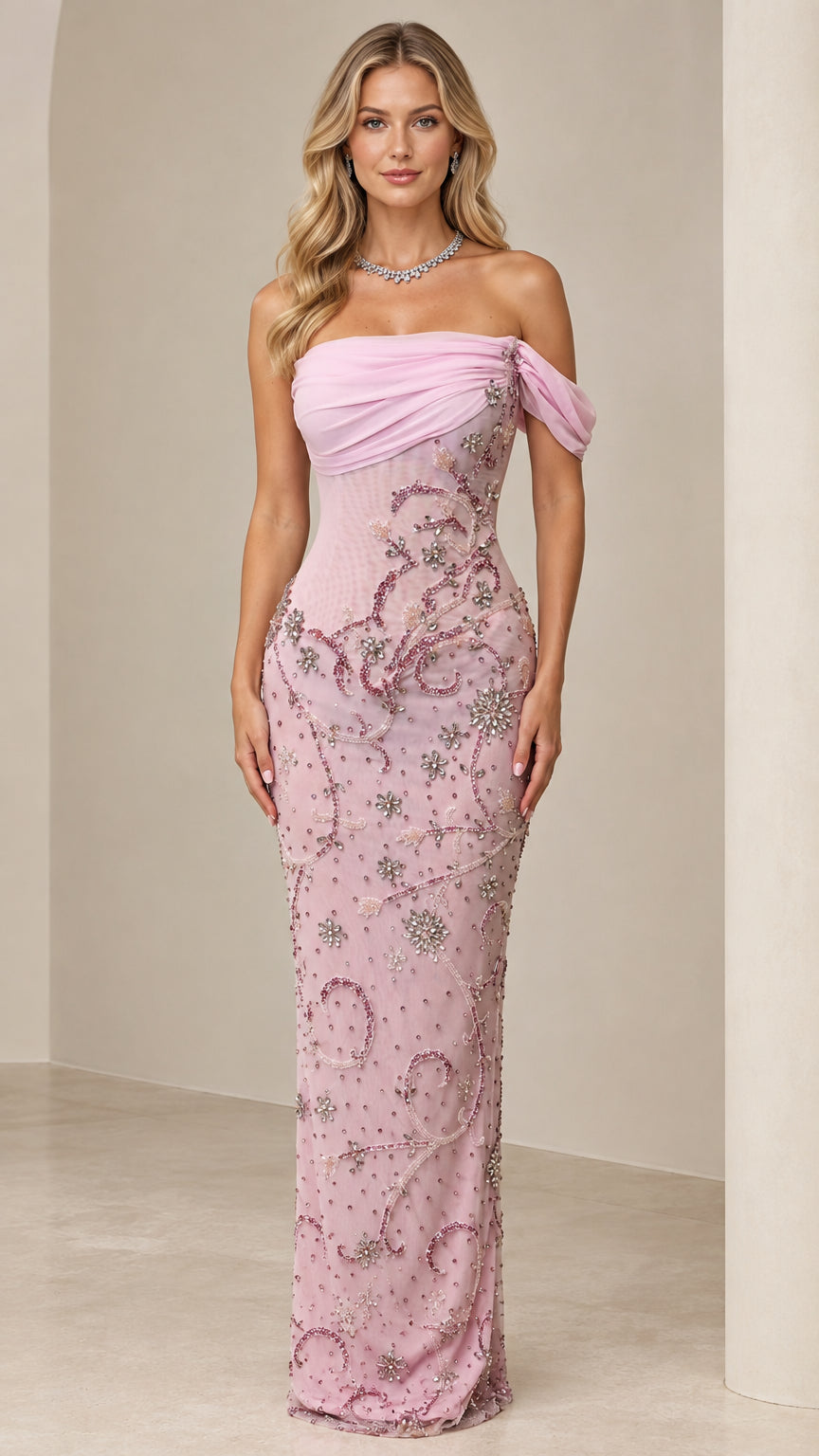 Front view of model wearing a dusty rose off-the-shoulder beaded column evening gown