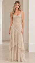 Front view of model wearing Champagne scoop neck beaded tiered evening gown
