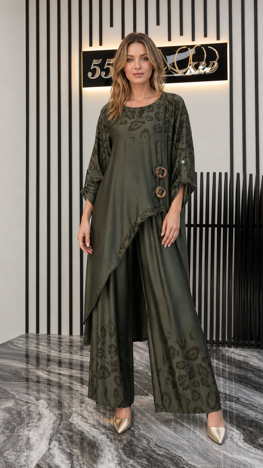 Front view of woman wearing olive green asymmetrical tunic and wide-leg pants set