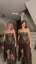 Two women wearing the brown Viking warrior corset top and asymmetrical skirt costume set with accessories