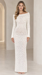 Front view of model wearing white long sleeve crochet knit maxi dress