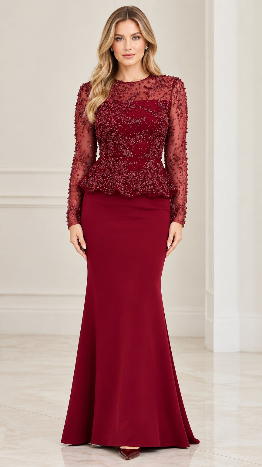 Front full-length view of woman wearing burgundy long sleeve beaded peplum maxi evening dress