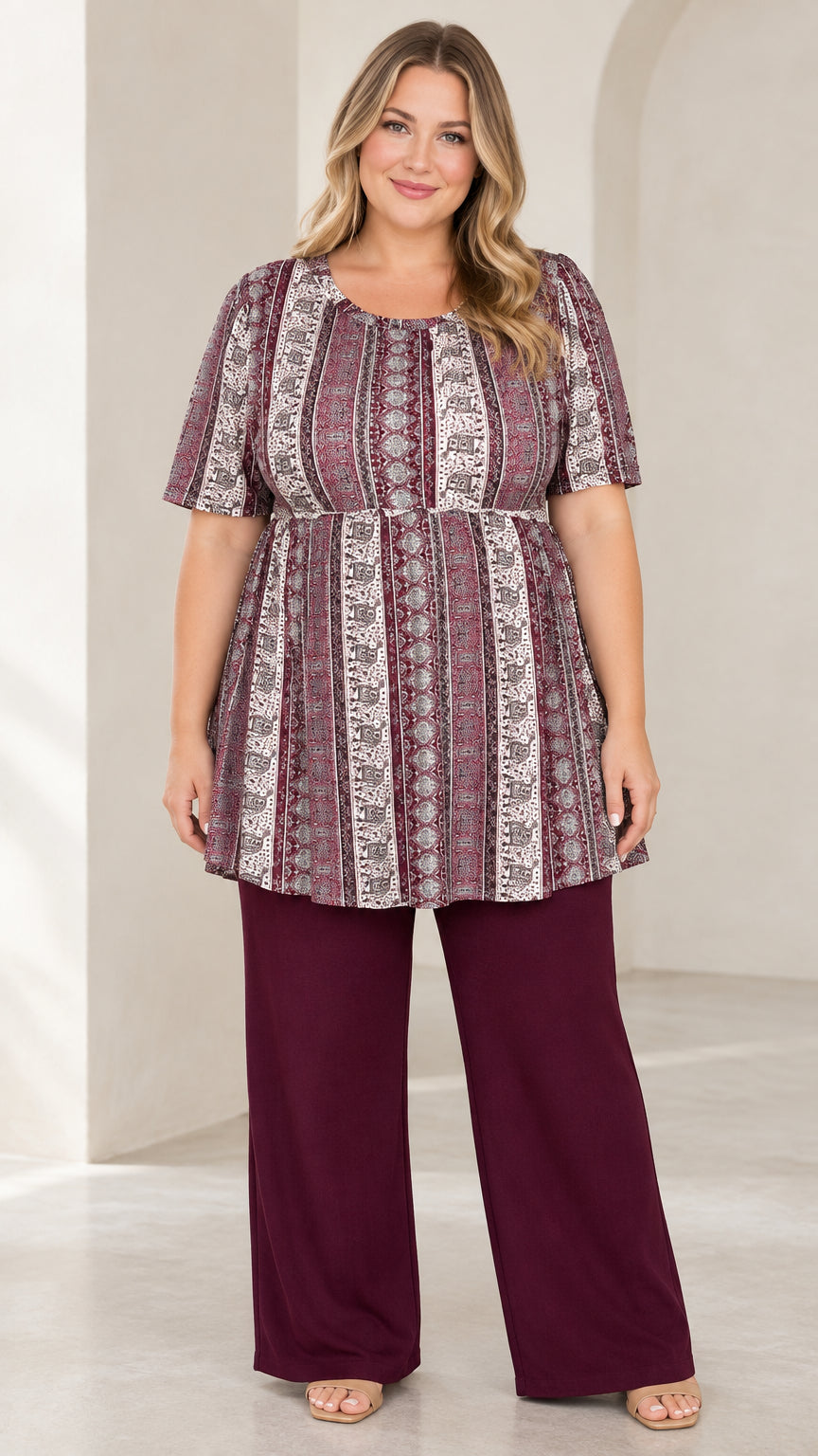 Front view of model wearing Burgundy vintage print empire waist tunic and matching wide leg pants