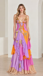 Front view of model wearing multicolor plunge neck tiered ruffle embroidered gown