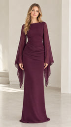 Front view of model wearing burgundy long flare sleeve ruched evening gown