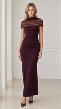 Front view of model wearing burgundy sheer cowl neck column maxi evening gown