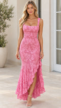 Front view of model wearing pink floral jacquard square neck mermaid maxi dress with ruffle slit