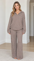 Women's brown striped two-piece loungewear set with long sleeve polo top and wide leg pants front view