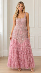 Dusty pink sleeveless maxi evening gown with beaded bodice and feathered fringe skirt front view