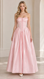 Front view of model wearing pink strapless corset ball gown maxi dress