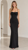 Front view of model wearing the black sequin bust spaghetti strap maxi evening dress