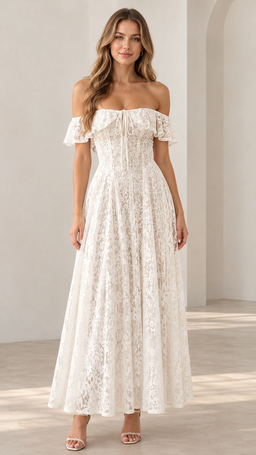 Full front view of a woman wearing a white off-the-shoulder floral lace maxi dress