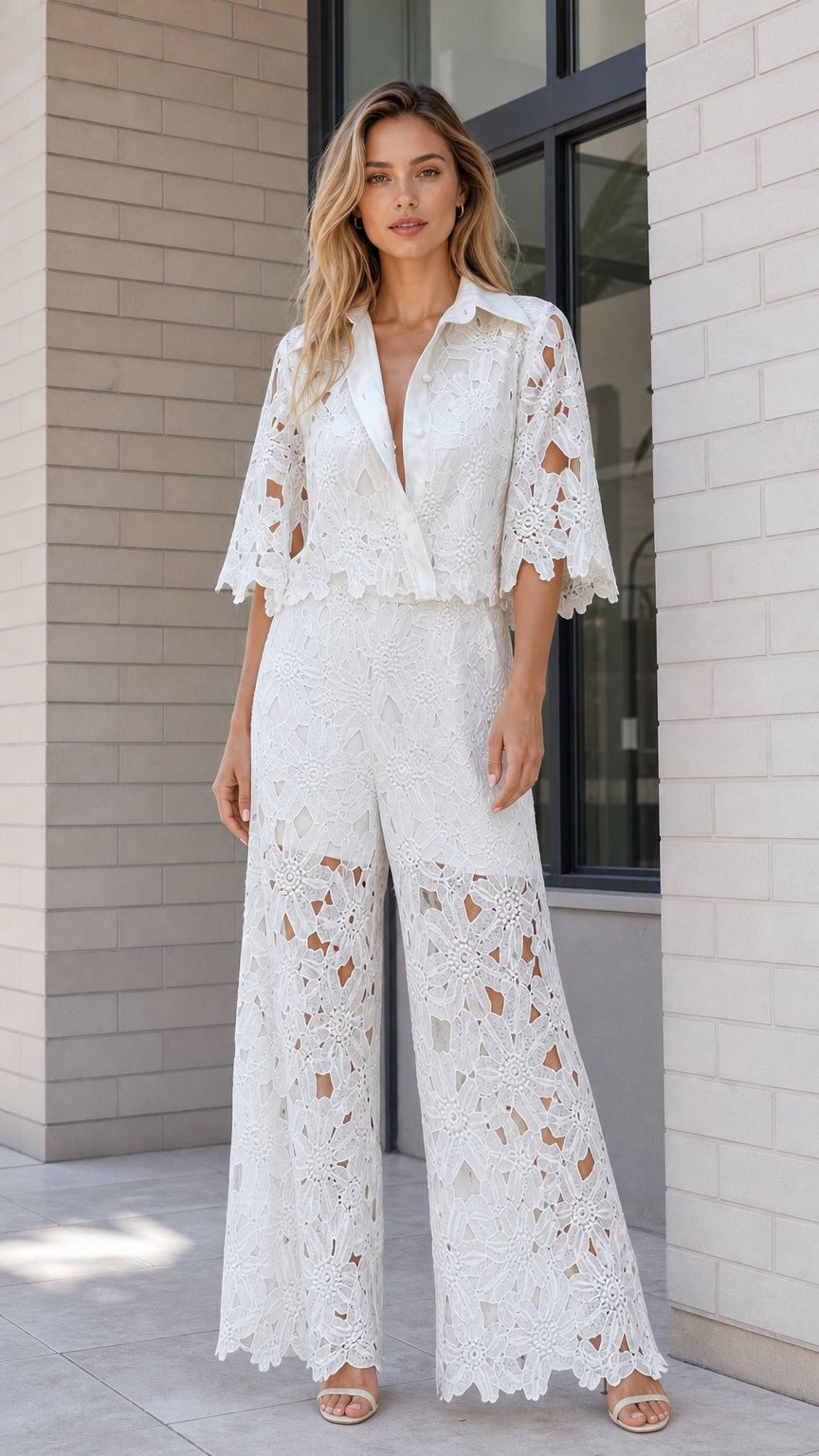Full front view of model wearing white floral cutout lace collared top and wide-leg pants set