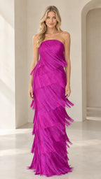Front full-length view of model wearing magenta strapless tiered fringe maxi dress