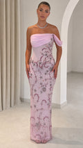 Front full view of model in pink off-the-shoulder beaded column evening gown