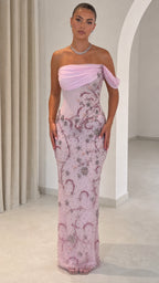 Front full view of model in pink off-the-shoulder beaded column evening gown