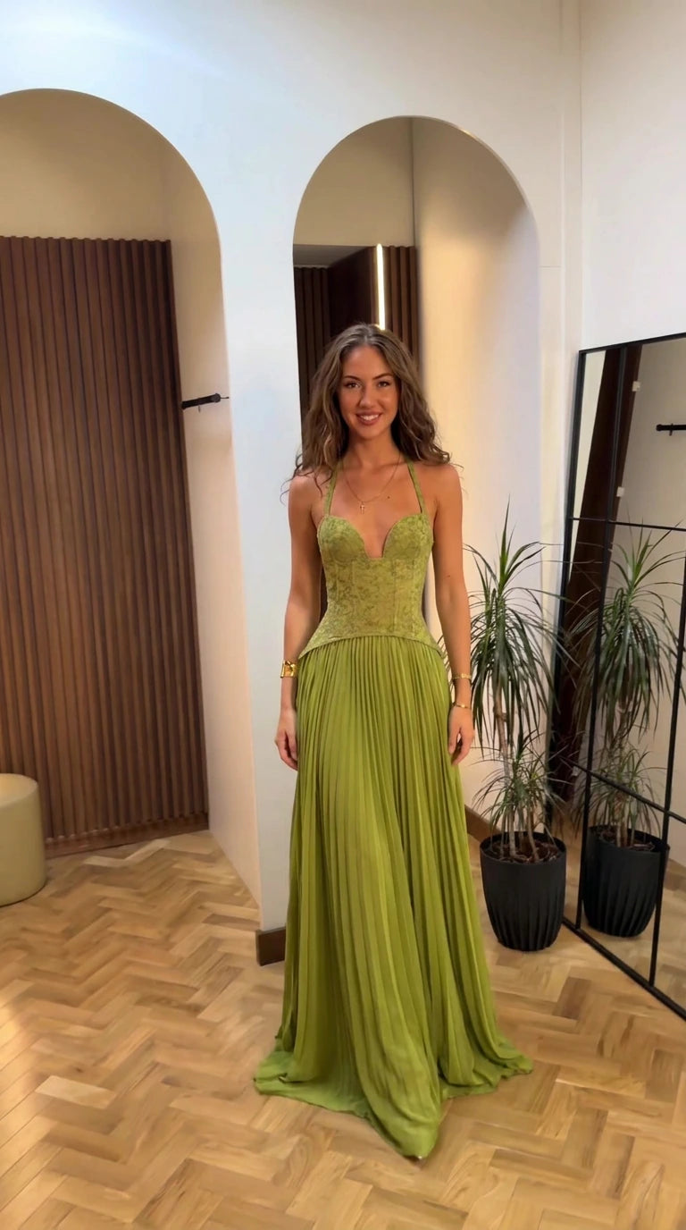 Front view of olive green lace halter corset pleated maxi evening dress on model