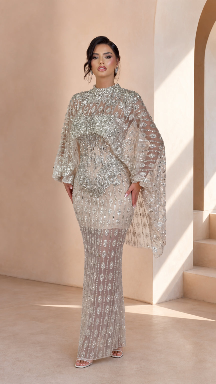 Front view of model wearing Silver Embellished Cape Sleeve Evening Maxi Dress