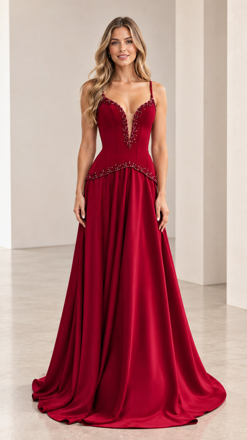 Front view of model wearing burgundy beaded plunge neckline A-line evening gown
